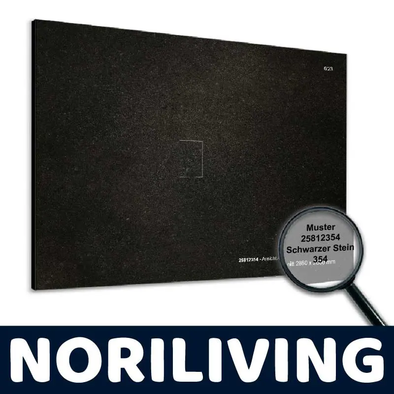 Musterplatte aus schwarzem Stein mit der Nummer 25812354 von Noriliving, vergrößert dargestellt mit einer Lupe